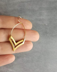 single piece of chevron earring in hand by chokha india