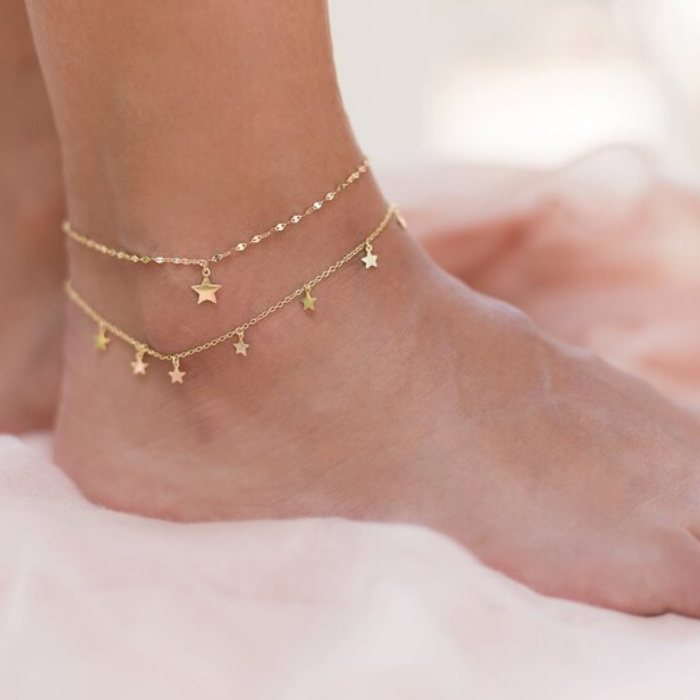 model wearing dainty star charm anklet with dainty star ankle bracelet by chokha india